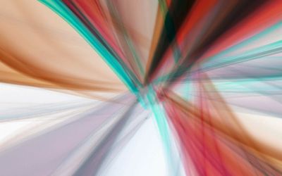 Abstract image of light streaks creating a sense of fluid motion.